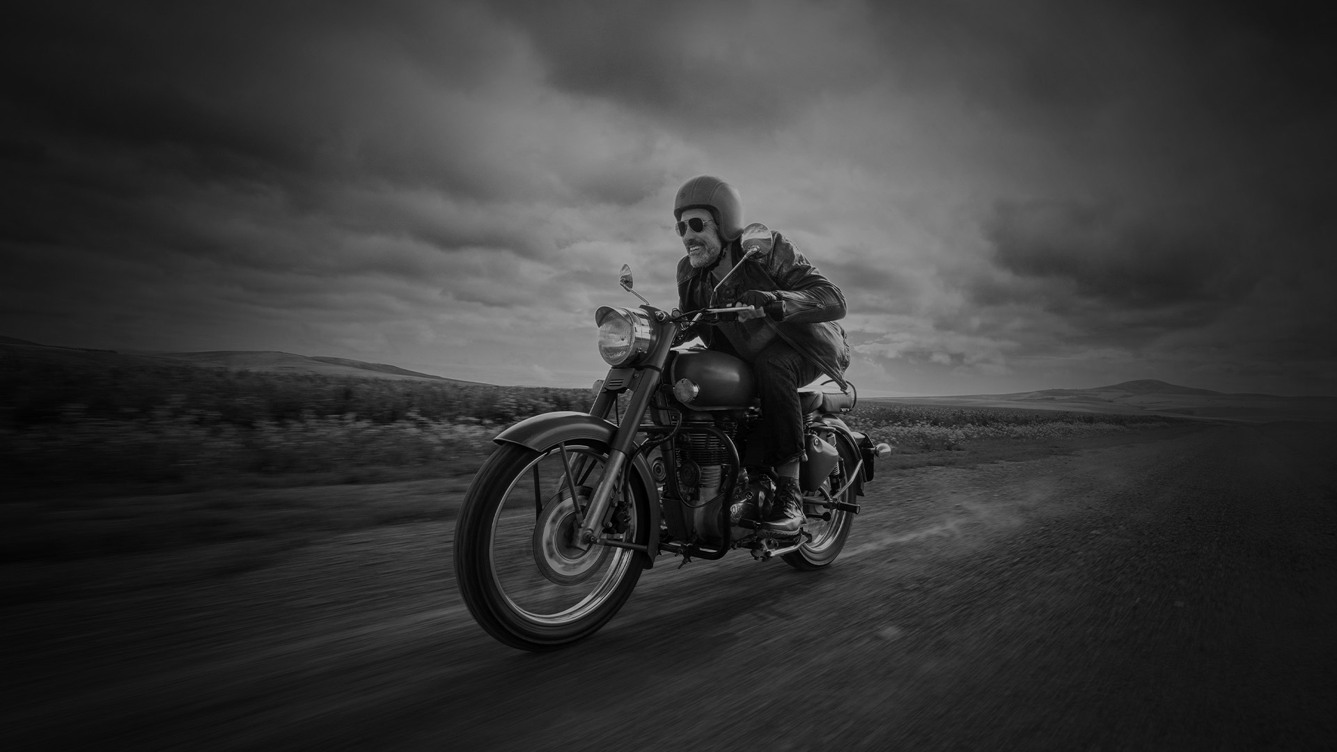 Non-descript man riding motorbike